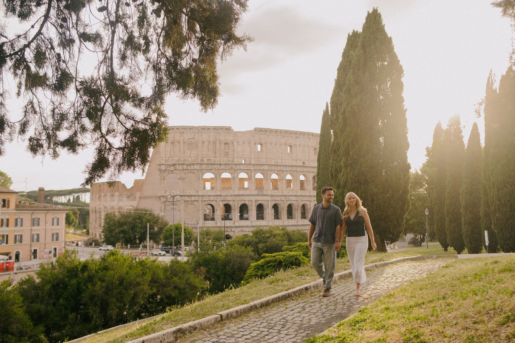 Sarah and Dax walking near the Colosseum